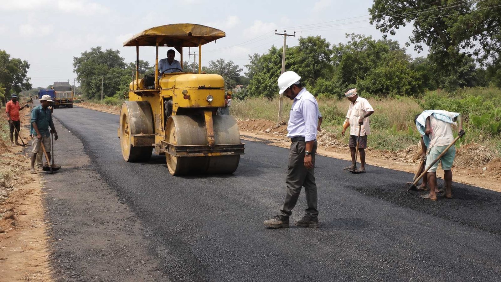 Road roller compaction during Medak R&B road construction